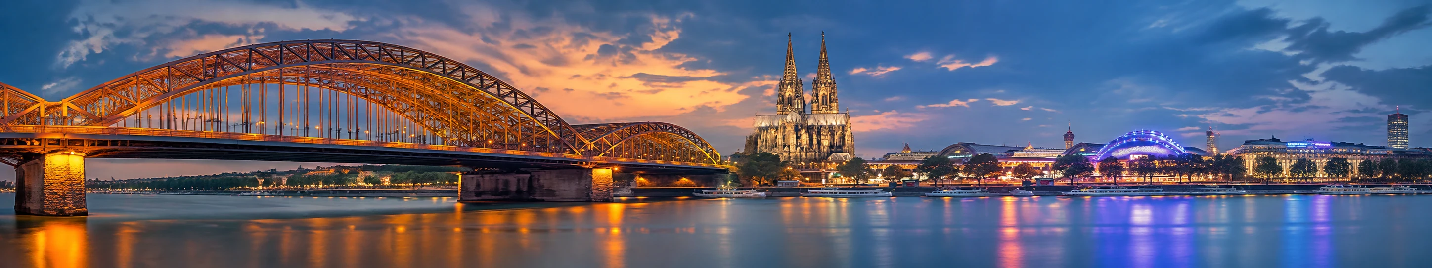 Germany public holidays 2027 calendar banner with Cologne Cathedral and Hohenzollern Bridge